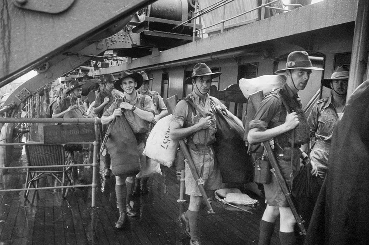 Troops aboard transport awaiting disembarkation in Singapore, Malaya (Australian War Memorial 009249/19)