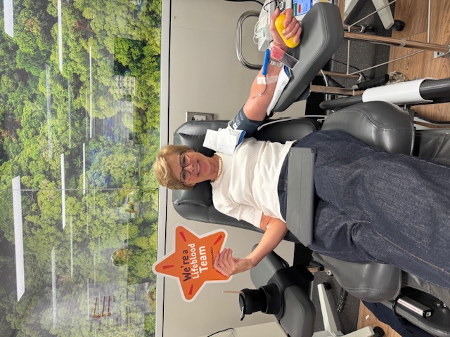 CBA non-executive director Lyn Cobley recently giving blood.