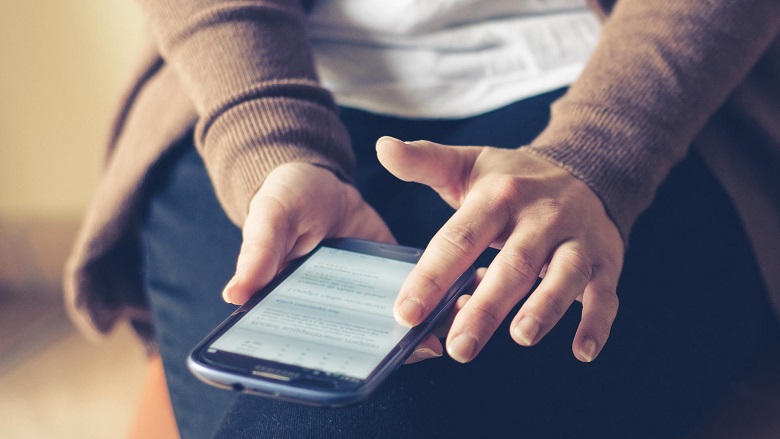 smart phone in woman's hands