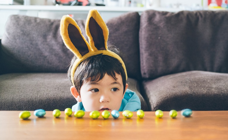 Kid with Easter eggs