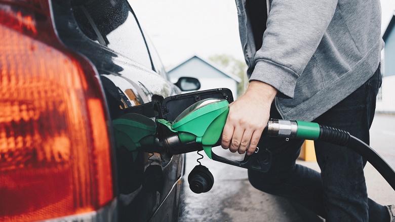 Photo of car being filled at petrol pump