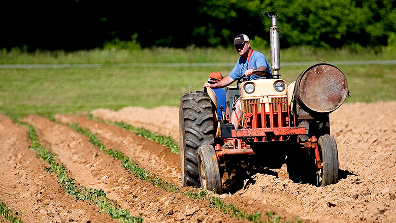 man on tractor