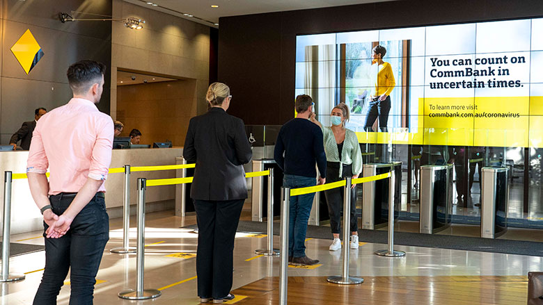 CBA staff queue to have temperatures checked in April 2020
