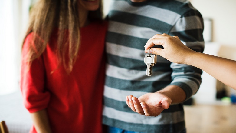 couple being given keys
