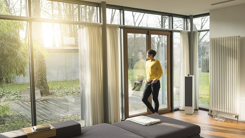 Woman standing at window