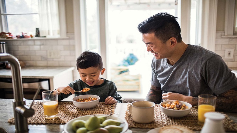 father and son in kitchen