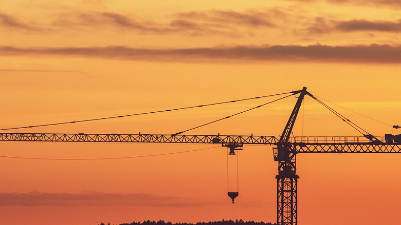 building site crane at sunset