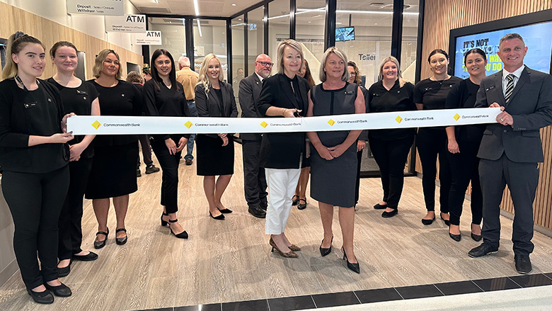 Employees and community members cut the ribbon at the Commonwealth Bank branch in Lismore, NSW