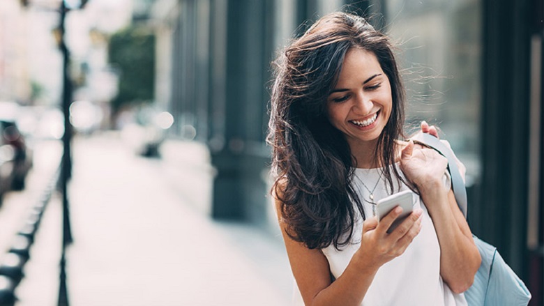 Woman holding a mobile phone