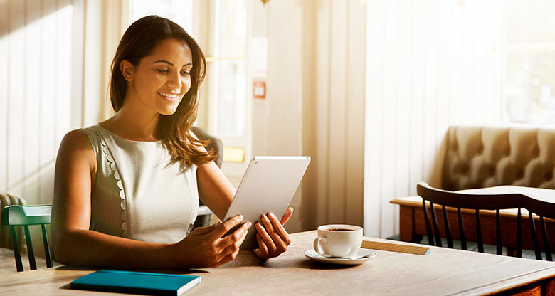 Woman looking at tablet computer