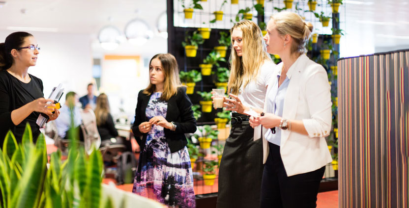 Female CommBank staff in discussion