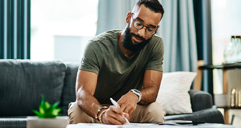 Man writing with pen