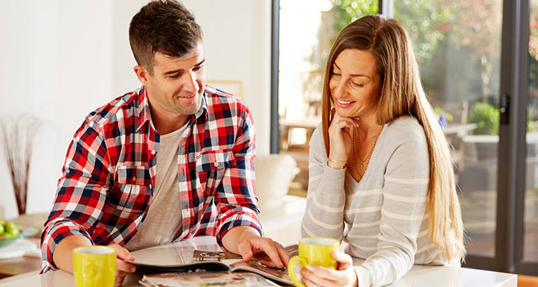 Couple at home reading