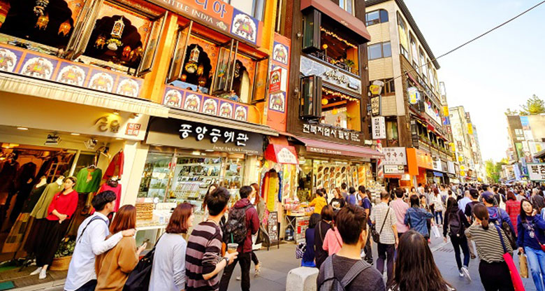 Image of people walking on a street