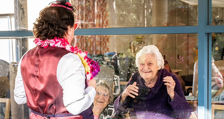 Monty the elder clown with aged care residents in Nowra