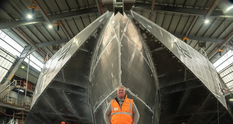 Craig Clifford with one of the ships they're building