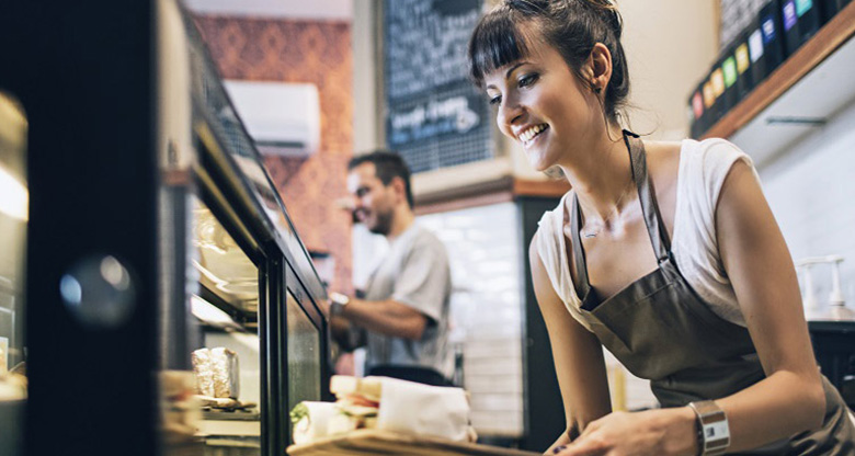 Woman working in cafe