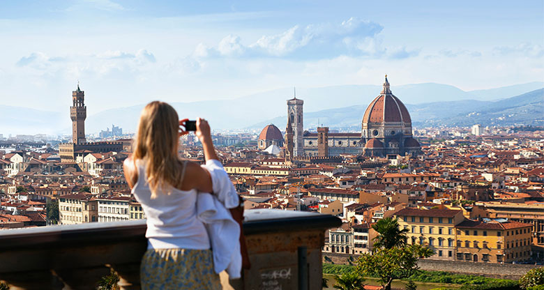 Italian city holiday girl with camera