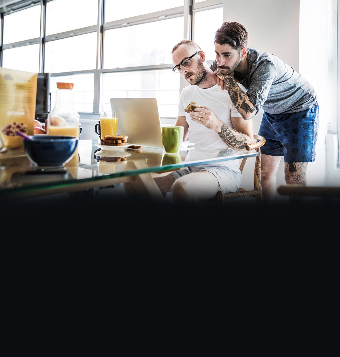 Couple looking at computere