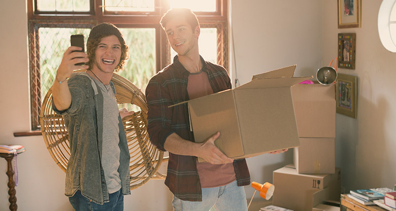 Two men moving house