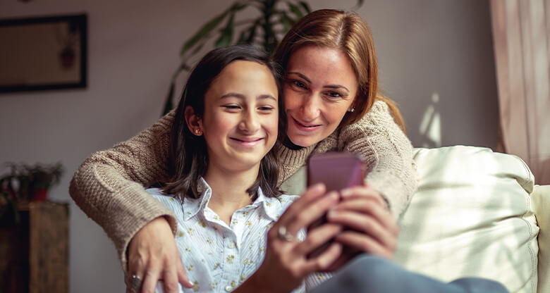 Teenagers on their mobile phone