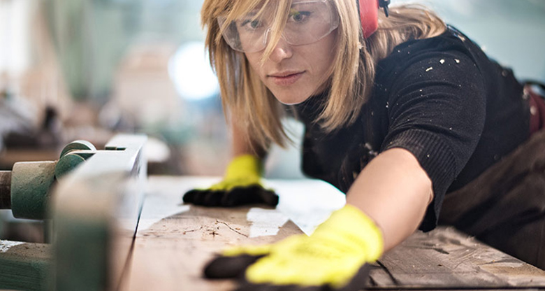 Image of a female carpenter working 