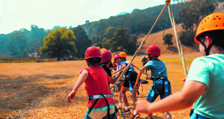 Kids playing in outdoor education activity