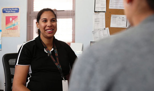 A woman in her office