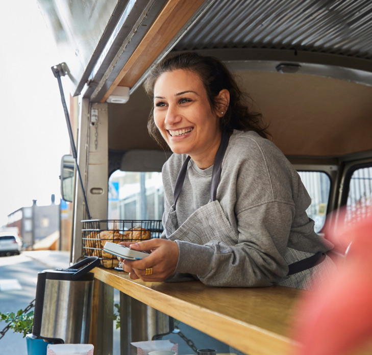 Woman working at coffee van