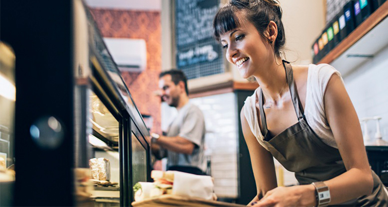 woman cleaning cafe