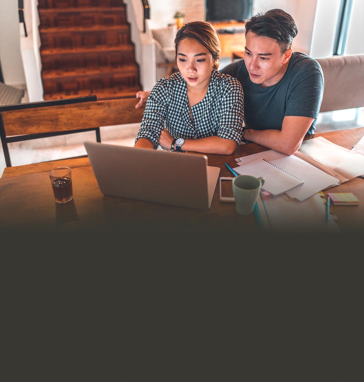 couple looking at laptop