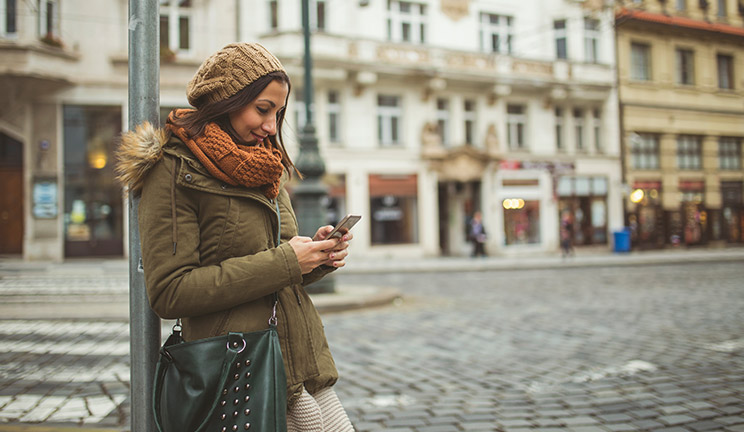 Person looking at CommBank app on phone