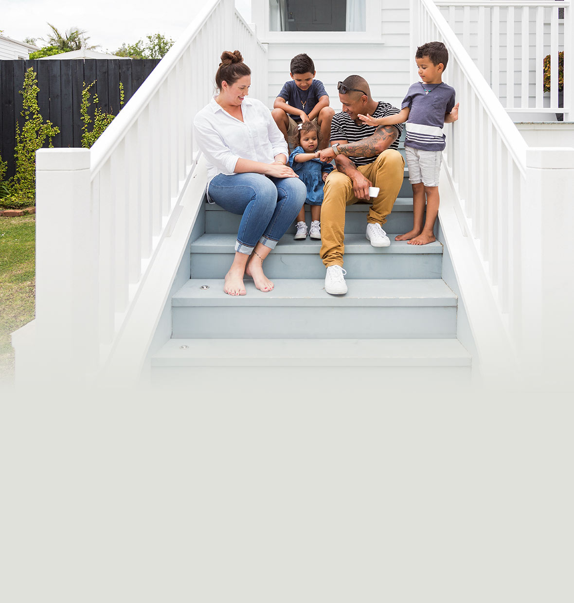 family outside their home