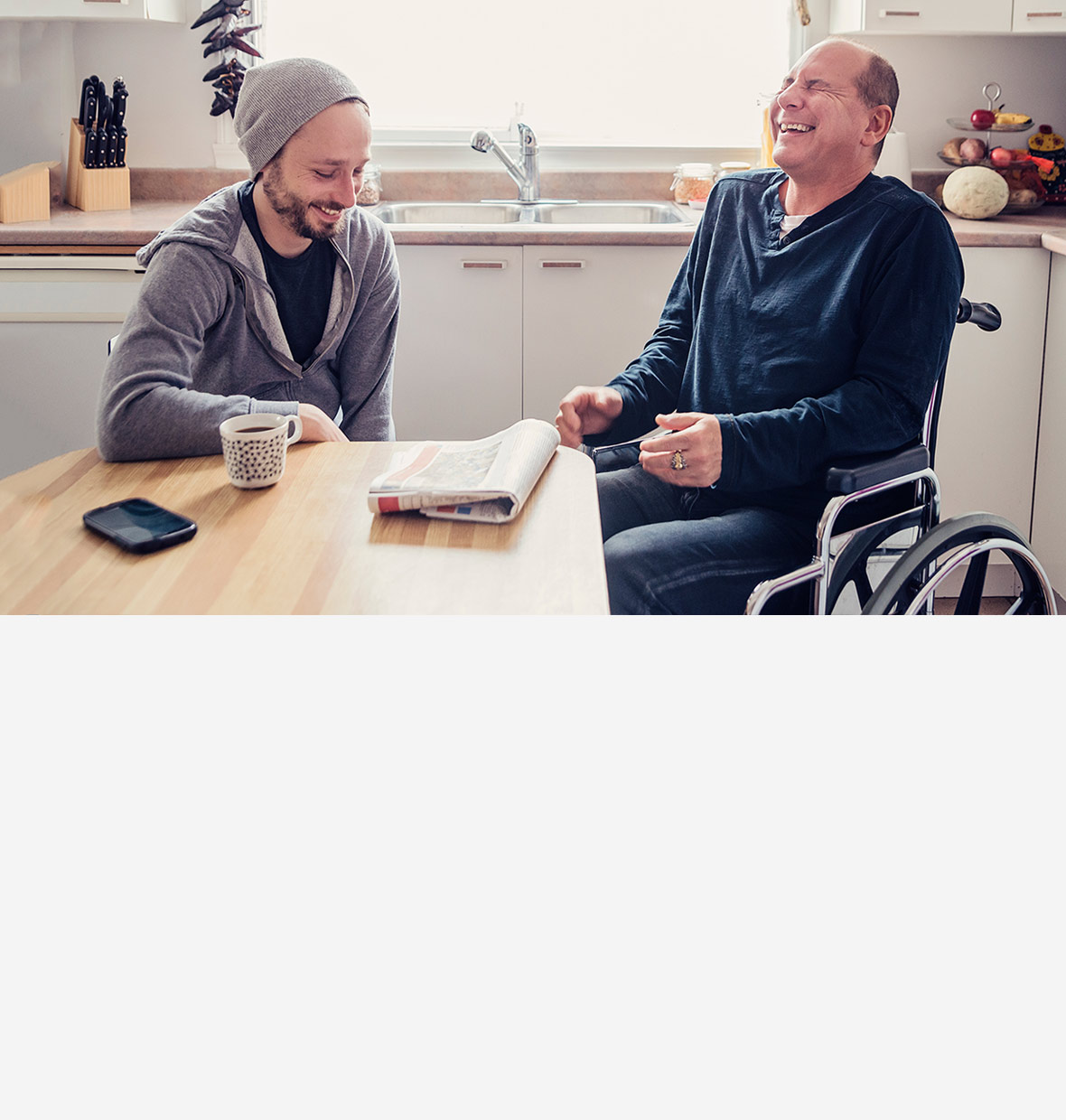 Two people at kitchen table