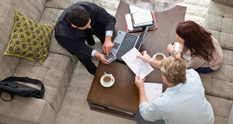 Couple at table with lender