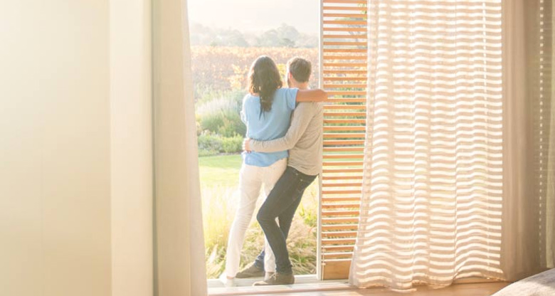 couple looking out backyard