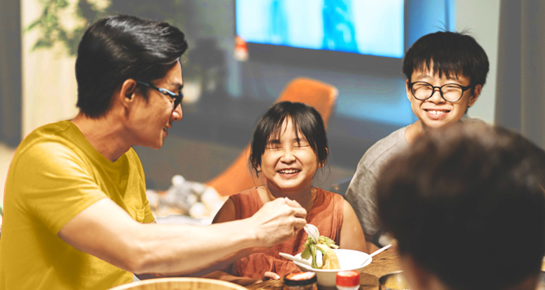 Family eating dinner together