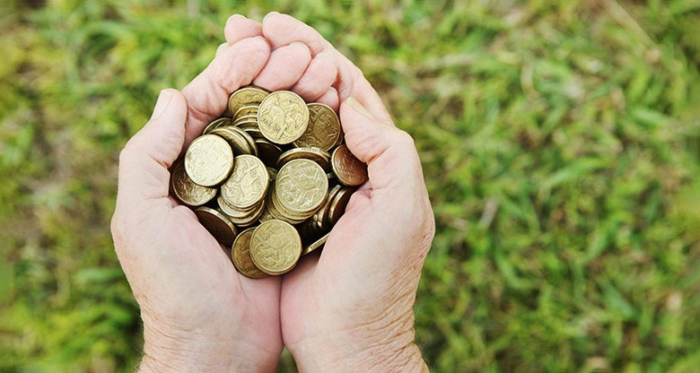 Hands with coins