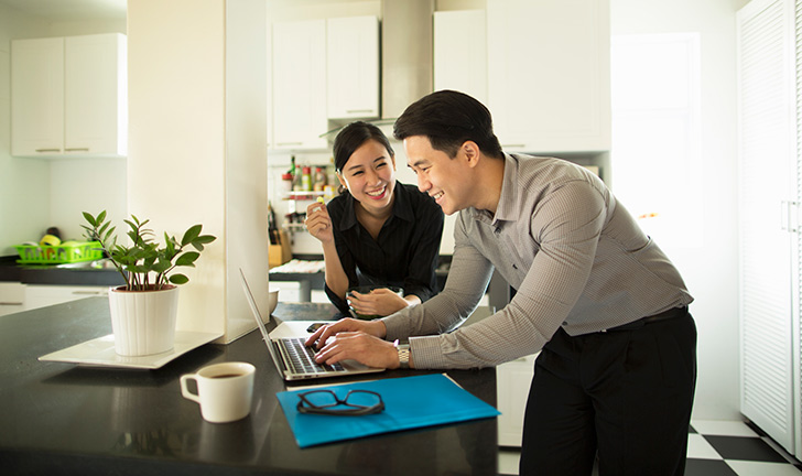 A CommBank Home Lending Specialist with his client