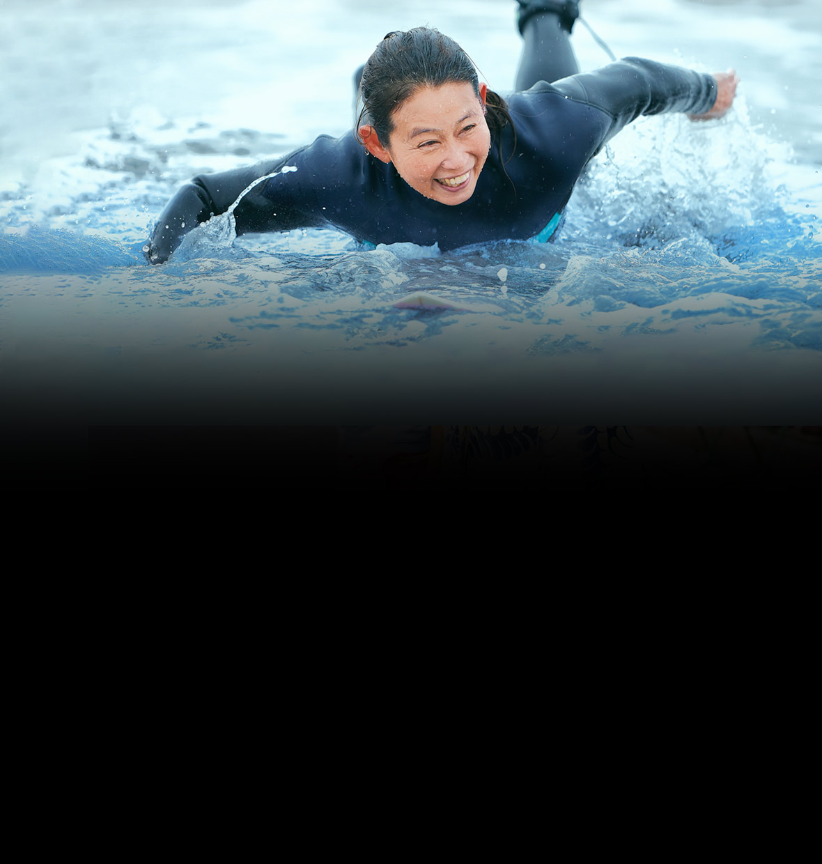 Asian woman surfing in Australia