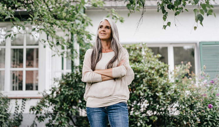 Female small business owner is checking her phone