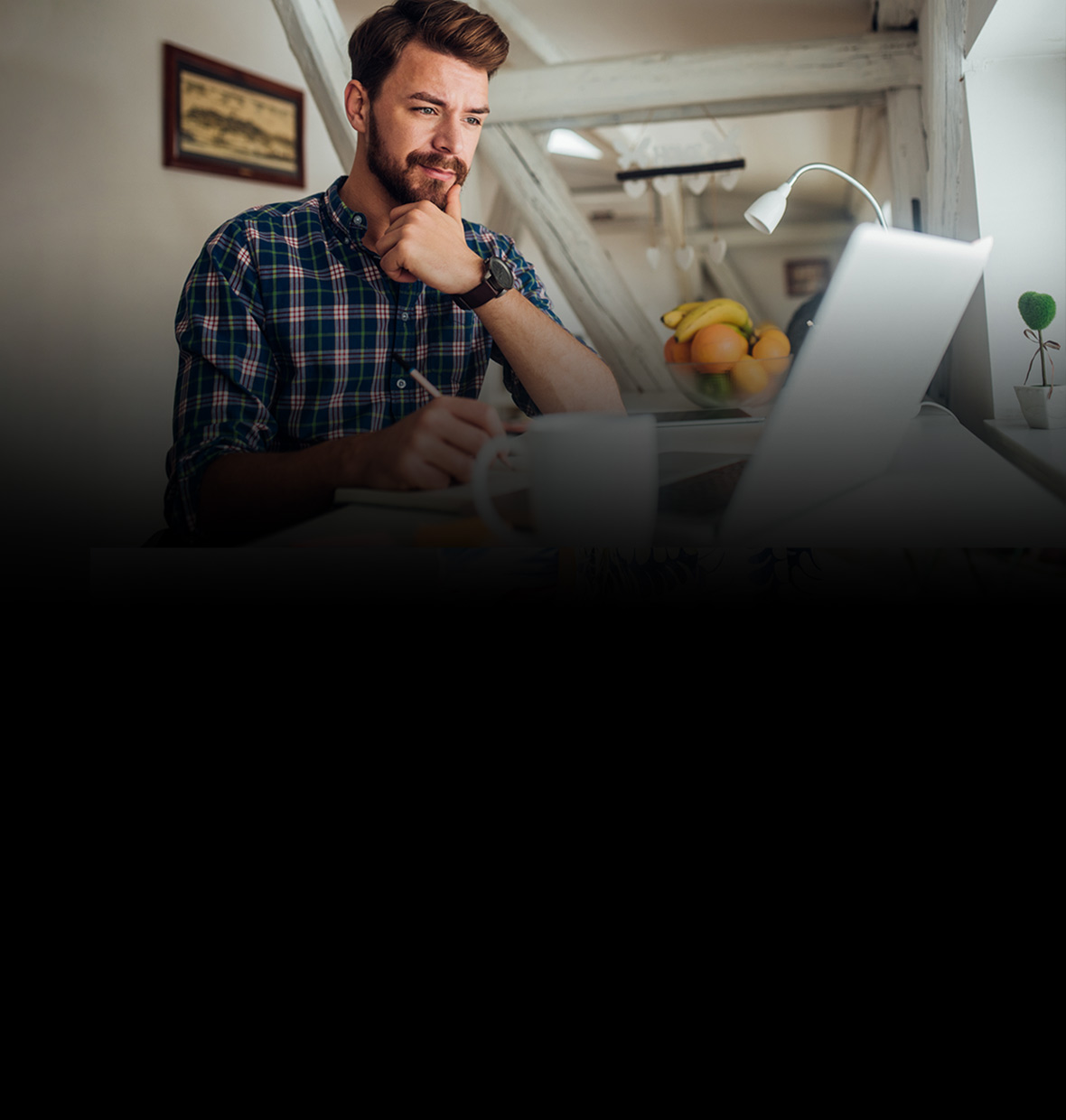 Young man working on his computer