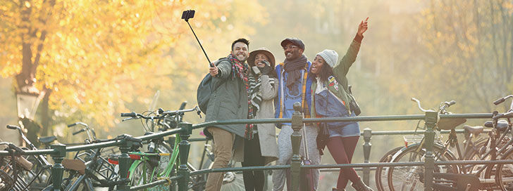 Group taking selfie in Amsterdam