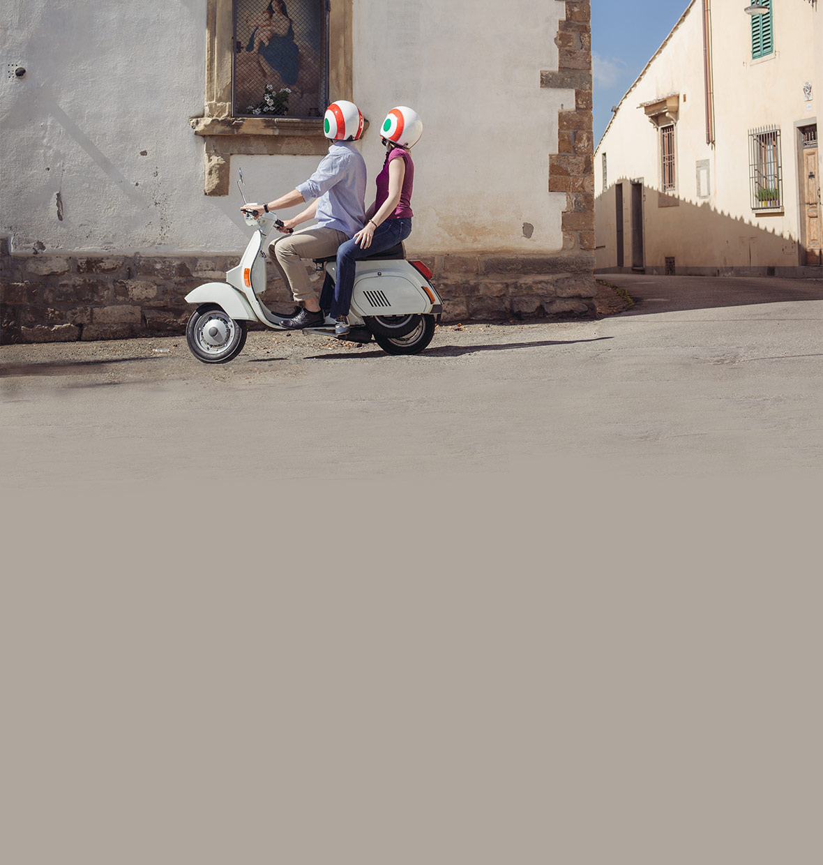 Couple travelling on a scooter