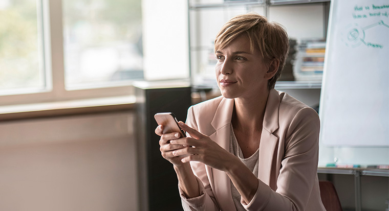 Woman on phone in the office