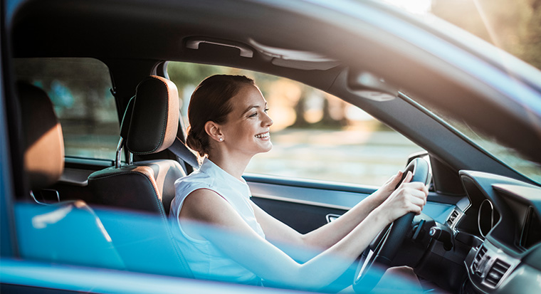 woman driving in car