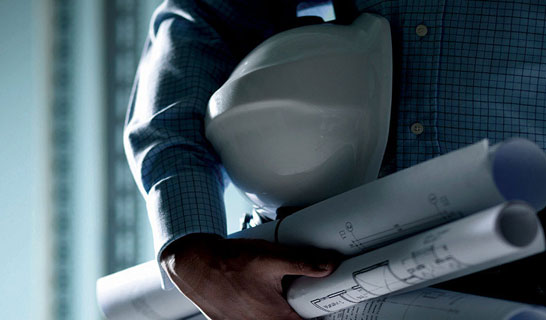 hard hat and blueprints