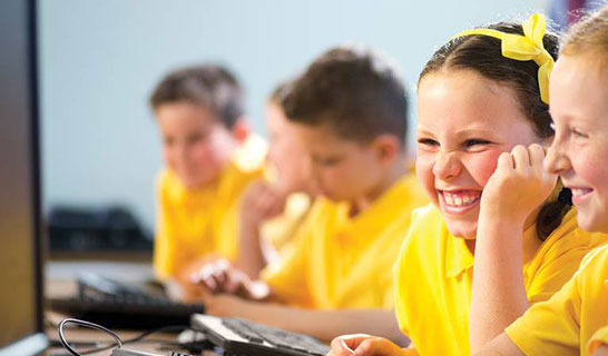 School kids on computer