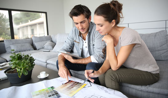 Couple looking at paint samples