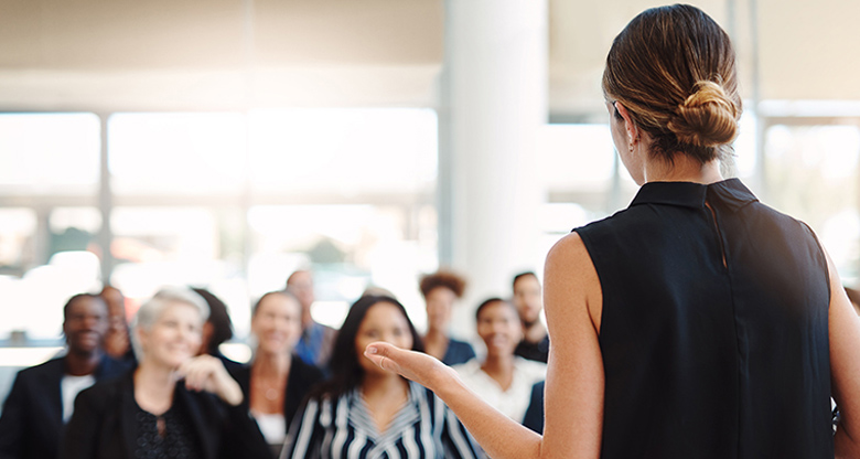 Woman presenting to audience